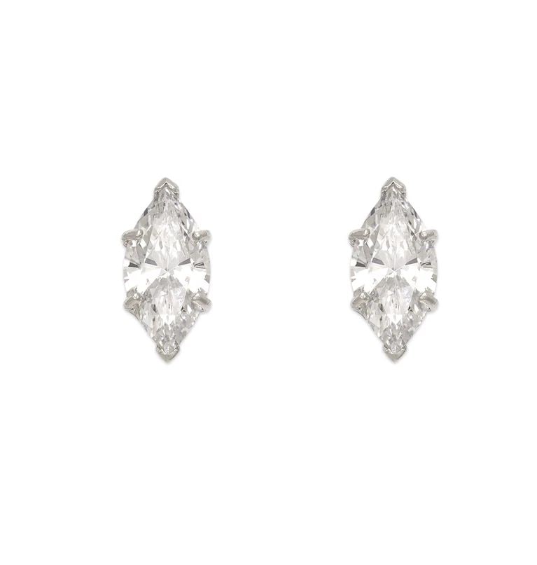 NEW 14K WHITE GOLD MARQUISE CUT STUD EARRINGS: NEW 14K WHITE GOLD MARQUISE CUT STUD EARRINGS MARQUISE CUT STUD EARRINGS NEW 14K WHITE GOLD Width: Approx. 6x13mm Apx WEIGHT: 2g
