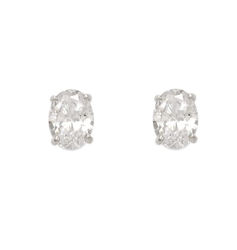 NEW 14K WHITE GOLD OVAL CUT STUD EARRINGS: NEW 14K WHITE GOLD OVAL CUT STUD EARRINGS OVAL CUT STUD EARRINGS NEW 14K WHITE GOLD Width: Approx. 8mm Apx WEIGHT: 2g