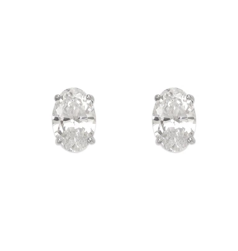 NEW 14K WHITE GOLD OVAL CUT STUD EARRINGS: NEW 14K WHITE GOLD OVAL CUT STUD EARRINGS OVAL CUT STUD EARRINGS NEW 14K WHITE GOLD Width: Approx. 9mm Apx WEIGHT: 2g
