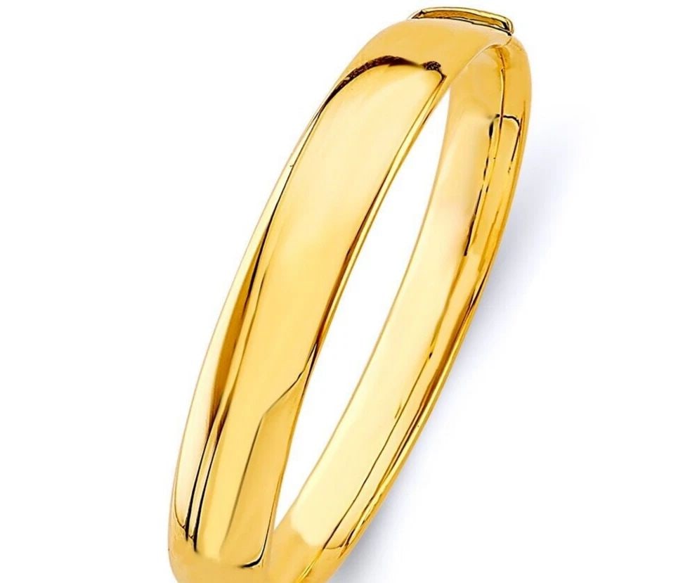 NEW 14K YELLOW GOLD 10MM PLAIN HOLLOW OVAL BANGLE: NEW 14K YELLOW GOLD 10MM PLAIN HOLLOW OVAL BANGLE 10MM PLAIN HOLLOW OVAL BANGLE NEW 14K YELLOW GOLD LENGTH - 7in Apx WEIGHT - 22.3g .