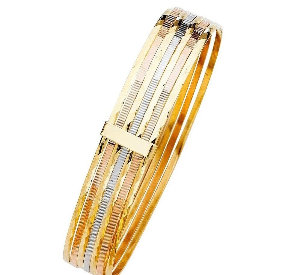 NEW 14K TRI COLOR GOLD 7 DAY SOLID BANGLE: NEW 14K TRI COLOR GOLD 7DAYS SOLID BANGLE 7DAYS SOLID BANGLE NEW 14K TRI COLOR GOLD LENGTH - 7in Apx WEIGHT - 20.2g .
