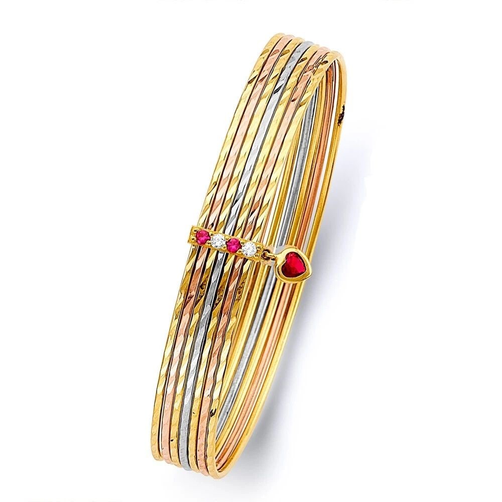 NEW 14K TRI COLOR GOLD 7 DAYS SOLID HEART BANGLE: NEW 14K TRI COLOR GOLD 7DAYS SOLID BANGLE 7DAYS SOLID BANGLE WITH NEW 14K C Z TRI COLOR GOLD LENGTH - 7in Apx WEIGHT - 16.3g