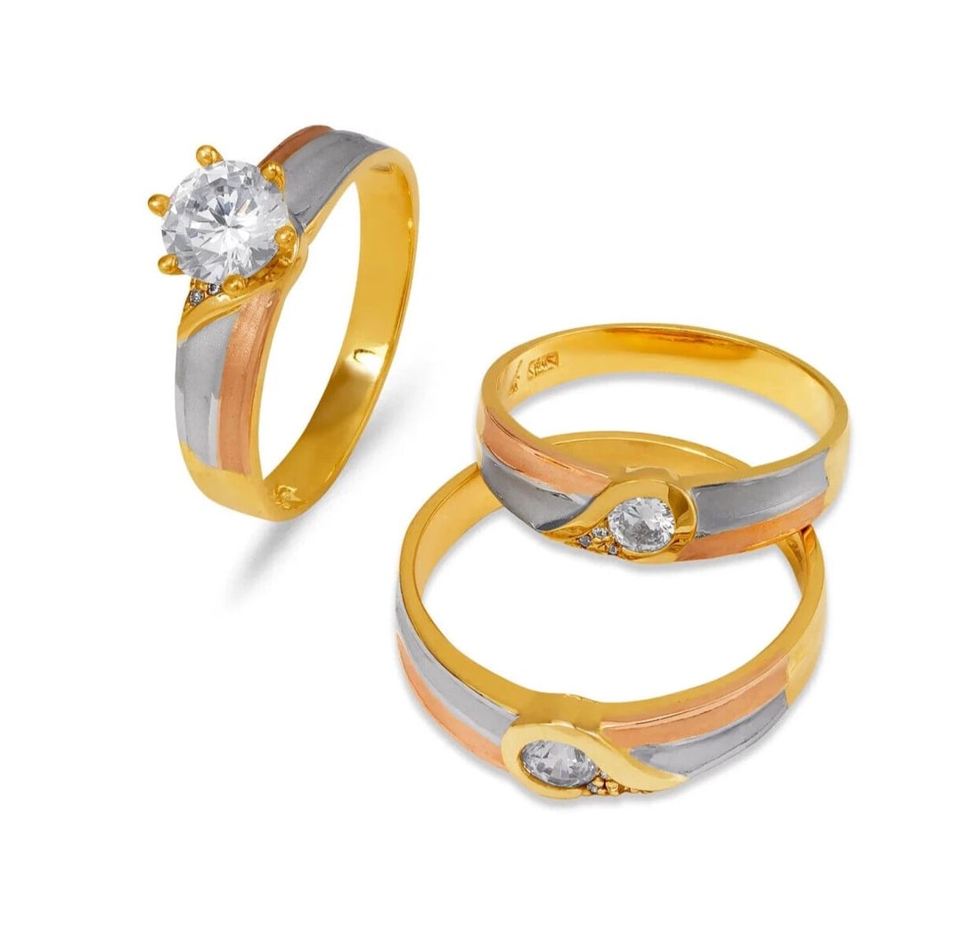 NEW 14K TRI COLOR GOLD WEDDING TRIO RING SET: NEW 14K TRI COLOR GOLD WEDDING TRIO RING SET 14K Tricolor Gold Ladies band and engagement ring is size 7 Men's ring is size 10 Rings Also Sold Separately Weight: 9.4 Grams