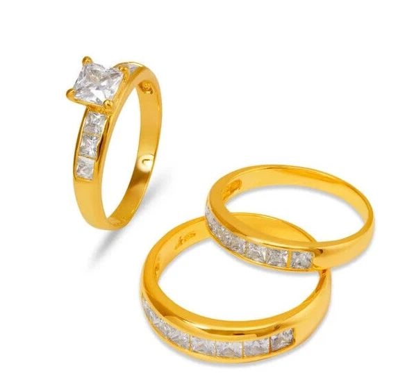 NEW 14K YELLOW GOLD WEDDING TRIO RING SET: NEW 14K YELLOW GOLD WEDDING TRIO RING SET 14K Yellow Gold Ladies band and engagement ring is size 7 Men's ring is size 10 Rings Also Sold Separately Weight: 9.0 Grams