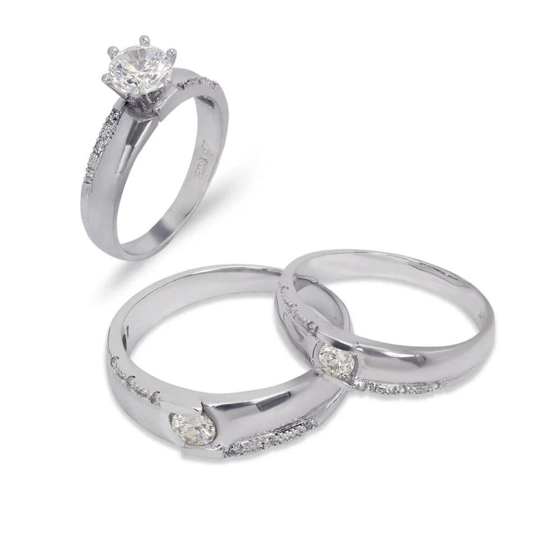 NEW 14K WHITE GOLD WEDDING TRIO RING SET: NEW 14K WHITE GOLD WEDDING TRIO RING SET 14K White Gold Ladies band and engagement ring is size 7 Men's ring is size 10 Rings Also Sold Separately Available in Yellow and Tricolor Gold Weight: 9.0 Gra