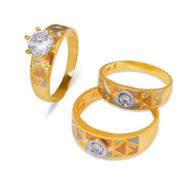 NEW 14K TRI COLOR GOLD WEDDING TRIO RING SET: NEW 14K TRI COLOR GOLD WEDDING TRIO RING SET 14K Tri color Gold Ladies band and engagement ring is size 7 Men's ring is size 10 Rings Also Sold Separately Weight: 8.9 Grams