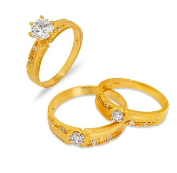 NEW 14K YELLOW GOLD WEDDING TRIO RING SET: NEW 14K YELLOW GOLD WEDDING TRIO RING SET 14K Yellow Gold Ladies band and engagement ring is size 7 Men's ring is size 10 Rings Also Sold Separately Available in Tricolor and White Gold Weight: 8.9 Gr