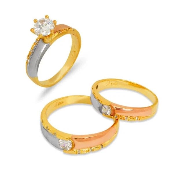NEW 14K TRI COLOR GOLD WEDDING TRIO RING SET: NEW 14K TRI COLOR GOLD WEDDING TRIO RING SET 14K Tricolor Gold Ladies band and engagement ring is size 7 Men's ring is size 10 Rings Also Sold Separately Available in Yellow and White Gold Weight: 8.8