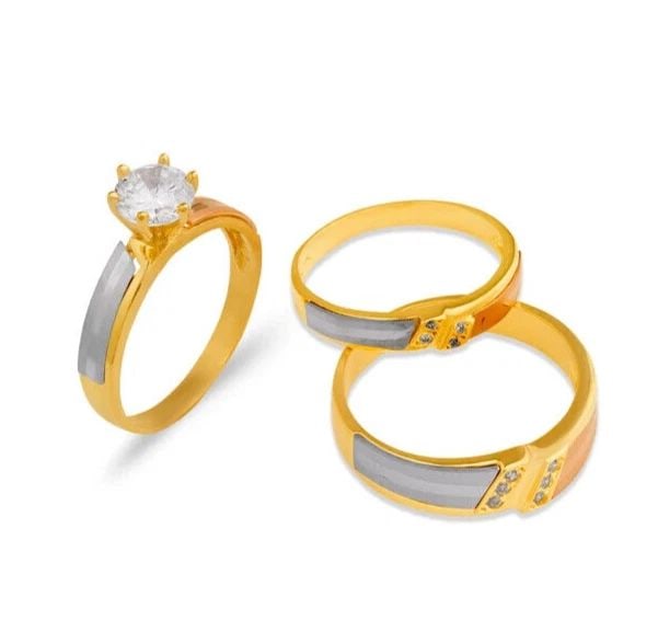 NEW 14K TRI COLOR GOLD WEDDING TRIO RING SET: NEW 14K TRI COLOR GOLD WEDDING TRIO RING SET 14K Tri Color Gold Ladies band and engagement ring is size 7 Men's ring is size 10 Rings Also Sold Separately Weight: 8.5 Grams