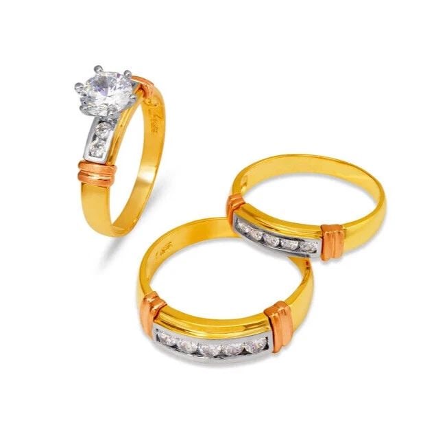NEW 14K YELLOW GOLD WEDDING TRIO RING SET: NEW 14K YELLOW GOLD WEDDING TRIO RING SET 14K Tricolor Gold Ladies band and engagement ring is size 7 Men's ring is size 10 Rings Also Sold Separately Available in Yellow and White Gold Weight: 8.3 Gr