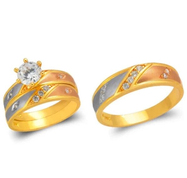 NEW 14K TRI COLOR GOLD WEDDING TRIO RING SET: NEW 14K TRI COLOR GOLD WEDDING TRIO RING SET 14K Tricolor Gold Ladies band and engagement ring is size 7 Men's ring is size 10 Rings Also Sold Separately Available in White Gold Weight: 8.2 Grams