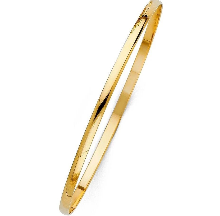 NEW 14K YELLOW GOLD 3MM SOLID BANGLE: NEW 14K YELLOW GOLD 3MM SOLID BANGLE 3MM SOLID BANGLE NEW 14K YELLOW GOLD LENGTH - 7in Apx WEIGHT - 6.9g .