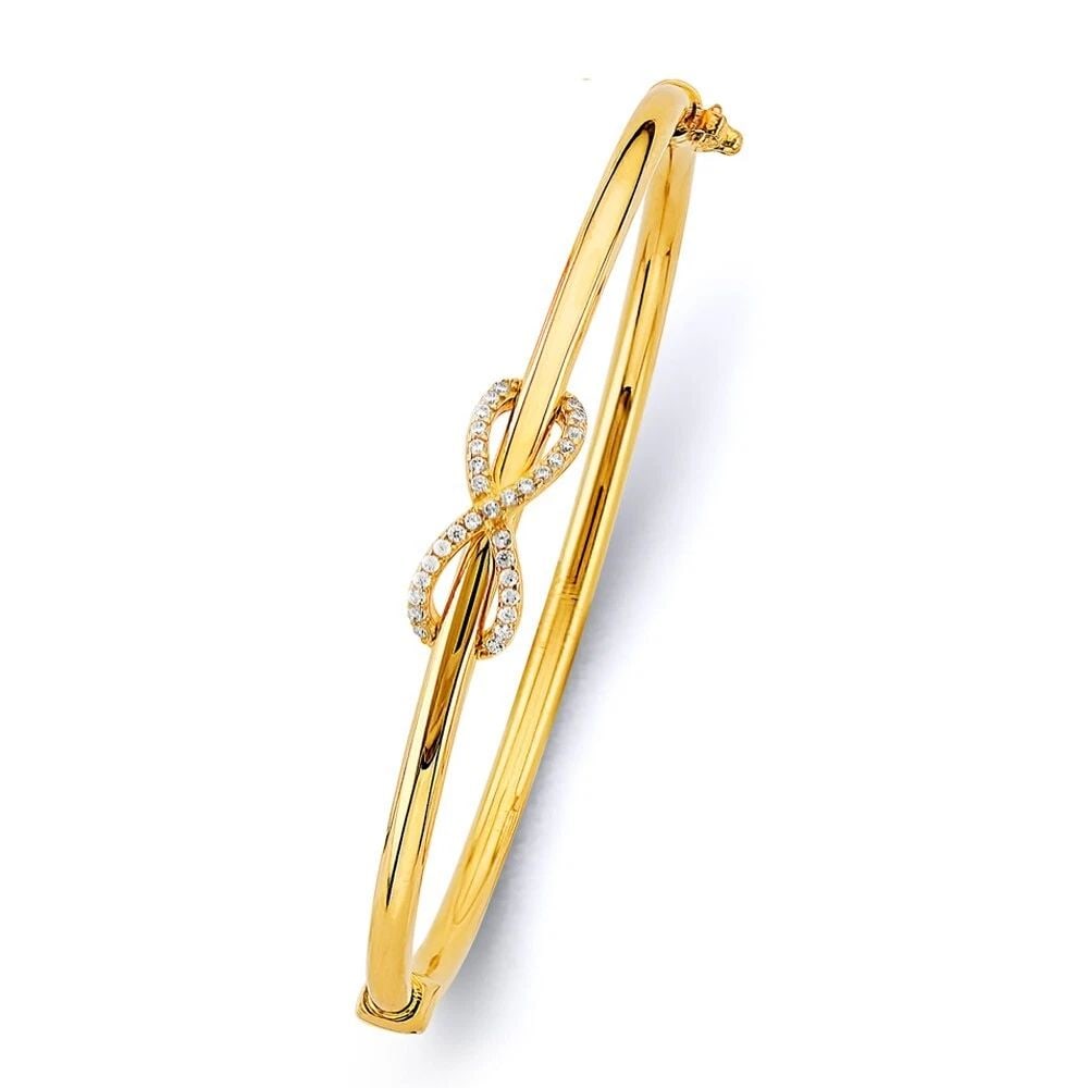 NEW 14K YELLOW GOLD INFINITY HOLLOW OVAL BANGLE: NEW 14K YELLOW GOLD HOLLOW OVAL BANGLE HOLLOW OVAL BANGLE NEW 14K YELLOW GOLD C Z LENGTH - 7in Apx WEIGHT - 6.5g