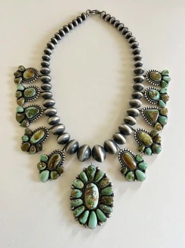 540G ERNEST ROY BEGAY NAVAJO STERLING SILVER ROYSTON TURQUOISE BLOSSOM NECKLACE: RARE (540g) Ernest Roy Begay Navajo Sterling Silver Royston Turquoise Blossom Necklace This Amazing necklace features huge specimens of Natural SUPER High-Grade Royston Turquoise, secure in a Smooth b
