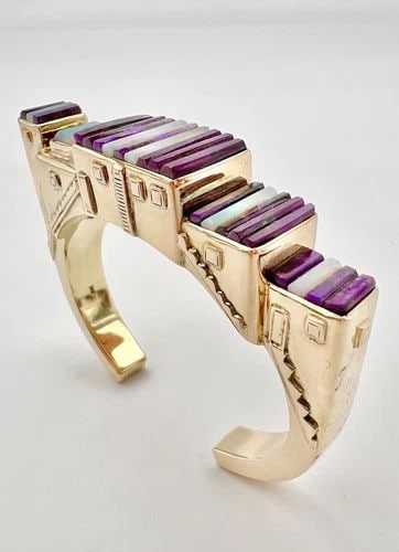 NAVAJO 14K YELLOW GOLD 3D SUGILITE & FIRE OPAL PUEBLO SCENE CUFF BRACELET 68.5G: NAVAJO 14K YELLOW GOLD 3D SUGILITE & FIRE OPAL PUEBLO SCENE CUFF BRACELET 68.5G Navajo 14K Yellow Gold 3D Sugilite & Fire Opal Pueblo Scene Cuff Bracelet 68.5g Cuff is 5 1/4" Tip to Tip and has a 1 1/