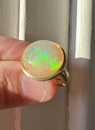 DESIGNER SATIN FINISH 18K YELLOW GOLD NATURAL AUSTRALIAN FIRE OPAL MODERN RING: DESIGNER SATIN FINISH 18K YELLOW GOLD NATURAL AUSTRALIAN FIRE OPAL MODERN RING Designer Satin Finish 18k Yellow Gold Natural Australian Fire Opal Modern Ring Ring Size: 5.5 - Can be Resized Weight is 