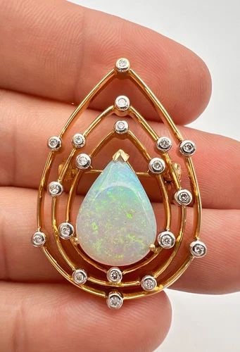 DESIGNER TAJ 18K YELLOW GOLD 3.19TCW AUSTRALIAN FIRE OPAL & DIAMOND PIN BROOCH: DESIGNER TAJ 18K YELLOW GOLD 3.19TCW AUSTRALIAN FIRE OPAL & DIAMOND PIN BROOCH Designer TAJ 18k Yellow Gold 3.19tcw Australian Fire Opal & Diamond Pin Brooch Size: 1 5/8" Tall By 1 1/8" Wide Metal: 18