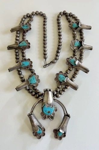 VTG NAVAJO STERLING SILVER BLUE GEM TURQUOISE STAMPED SQUASH BLOSSOM NECKLACE: Vtg Navajo Sterling Silver Blue Gem Turquoise Stamped Squash Blossom NecklaceThis Amazing necklace features huge specimens of Natural High-Grade Blue Gem Turquoise, secure in a Smooth bezel, and frame