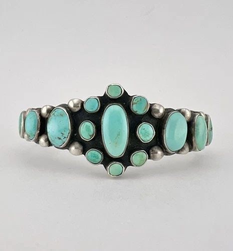1930S NAVAJO COIN SILVER INGOT CERRILLOS TURQUOISE STAMPED CUFF BRACELET 51.8G: OLD 1930s Navajo Coin Silver INGOT Cerrillos Turquoise Stamped Cuff Bracelet 51.8g Cuff is Just Over 5 1/4" tip to Tip and has a 1 1/4" Wide Gap Cuff Is 1 1/8" Wide In the Center Weight is 51.8 Grams 