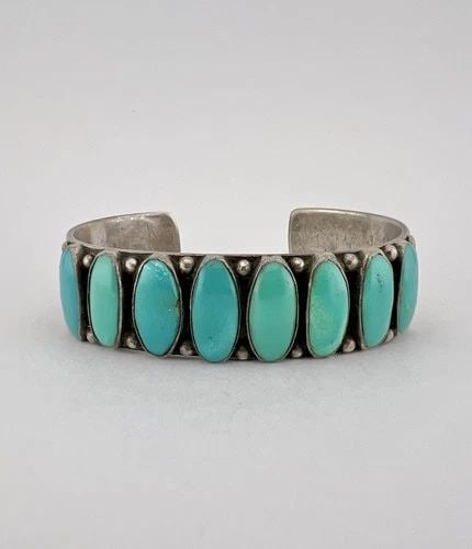 1940'S NAVAJO COIN SILVER INGOT CERRILLOS TURQUOISE STAMPED CUFF BRACELET 41.8G: OLD 1940's Navajo Coin Silver INGOT Cerrillos Turquoise Stamped Cuff Bracelet 41.8g Cuff is Just Over 5 1/4" tip to Tip and has a 1" Wide Gap Cuff Is 5/8" Wide In the Center Weight is 41.8 Grams on my