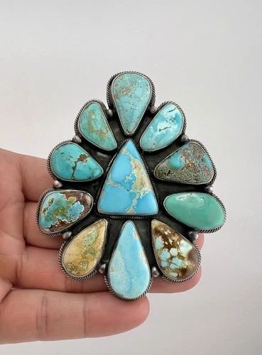 HUGE 86G DARREN LIVINGSTON NAVAJO STERLING SILVER HIGH GRADE TURQUOISE RING: MASSIVE 86g DARREN LIVINGSTON Navajo Sterling Silver High Grade Turquoise Ring Ring Size: 9 - Adjustable In Size Weight is 86.0 Grams on my scale Metal: Sterling Silver Face of The Ring is 3 5/8" Tall