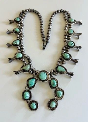 VTG NAVAJO STERLING SILVER DRY CREEK TURQUOISE SQUASH BLOSSOM NECKLACE 27" -186G: Vtg Navajo Sterling Silver Dry Creek Turquoise Squash Blossom Necklace 27" -186.5g This Amazing necklace features huge specimens of Dry Creek Turquoise, secure in a Smooth bezel. Necklace has 8.5mm Wi