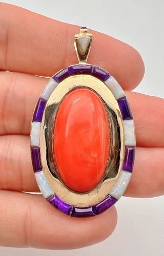 VINTAGE NAVAJO 14K YELLOW GOLD NATURAL RED CORAL & OPAL FLUSH INLAY PENDANT: VINTAGE NAVAJO 14K YELLOW GOLD NATURAL RED CORAL & OPAL FLUSH INLAY PENDANT Vintage Navajo 14k Yellow Gold Natural Red Coral & Opal flush inlay Pendant Size: 2 1/8" Tall By 1 1/8" Wide Metal: 14k Yell