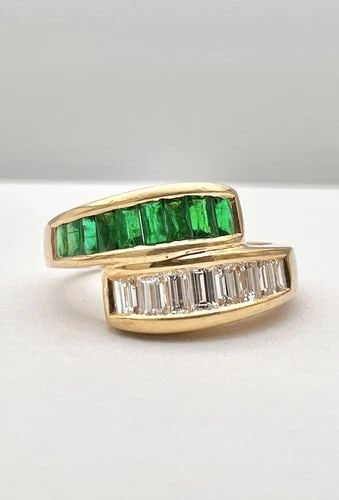 18K YELLOW GOLD EMERALD & DIAMOND BAGUETTE CHANNEL SET WRAP BYPASS BAND RING: 18K YELLOW GOLD EMERALD & DIAMOND BAGUETTE CHANNEL SET WRAP BYPASS BAND RING 18K Yellow Gold Emerald & Diamond Baguette Channel Set Wrap Bypass Band Ring Ring Size is 5.5 - Can Be Re Sized Total Weigh