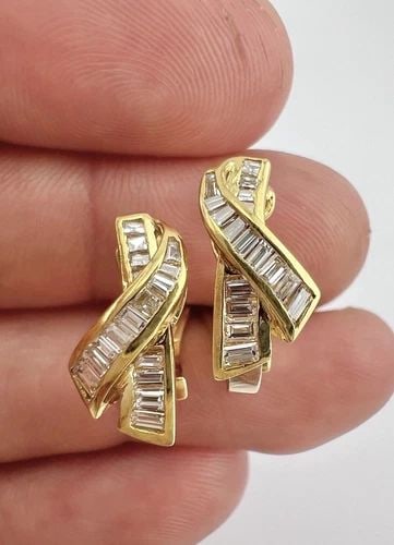18K YELLOW GOLD ASSCHER & BAGUETTE CUT DIAMOND OMEGA BACK POST INFINITY EARRINGS: 18K YELLOW GOLD ASSCHER & BAGUETTE CUT DIAMOND OMEGA BACK POST INFINITY EARRINGS Fine 18k Yellow Gold Asscher & Baguette Cut Diamond Omega Back Post Infinity Earrings Size: 5/8" (16mm) Tall & Over 1/4