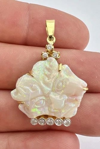 18K YELLOW GOLD CARVED DEMON FACE AUSTRALIAN FIRE OPAL & DIAMOND DANGLE PENDANT: 18K YELLOW GOLD CARVED DEMON FACE AUSTRALIAN FIRE OPAL & DIAMOND DANGLE PENDANT 18k Yellow Gold Carved Demon Face Australian Fire Opal & Diamond Dangle Pendant Size: Around 1 1/2" Tall With Bail by Ar