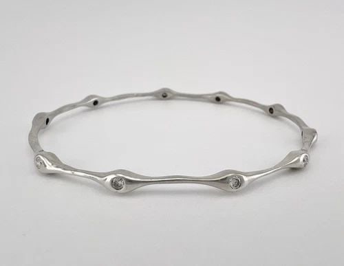 SONIA BITTON 14K WHITE GOLD MODERNIST ETERNITY DIAMOND STATION BANGLE BRACELET: SONIA BITTON 14K WHITE GOLD MODERNIST ETERNITY DIAMOND STATION BANGLE BRACELET SONIA BITTON 14K White Gold Modernist Eternity Diamond Station Bangle BraceletWeight 8.5 grams on my Sclae Size small, wi