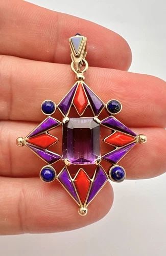 MODERNIST NAVAJO 14K YELLOW GOLD SUGILITE FIRE OPAL LAPIS AMETHYST CORAL PENDANT: MODERNIST NAVAJO 14K YELLOW GOLD SUGILITE FIRE OPAL LAPIS AMETHYST CORAL PENDANT Modernist Navajo 14k Yellow Gold Sugilite Fire Opal Lapis Amethyst Coral Pendant Size: 2" Tall With Bail By Over 1 1/4"