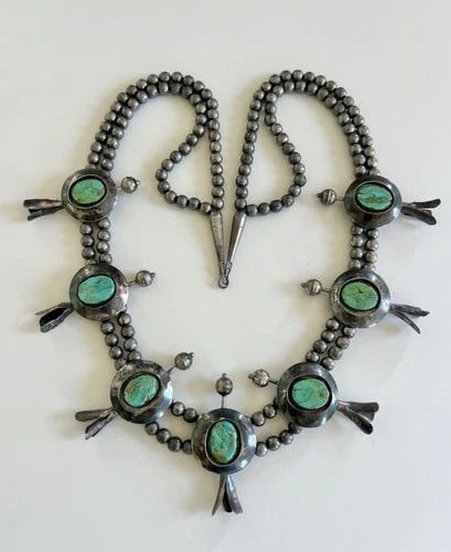 VINTAGE NAVAJO STERLING SILVER NATURAL NEVADA TURQUOISE SHADOWBOX NECKLACE 28.5": Vintage Navajo Sterling Silver Natural Nevada Turquoise Shadowbox Necklace 28.5" MEASUREMENTS: Necklace measures 28.5" tip to tip Center Pendant is 2 3/8" Tall By 1 1/8" Wide WEIGHT: 168.5 grams on my