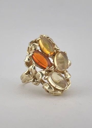 VINTAGE 14K YELLOW GOLD CABOCHON OVAL FIRE JELLY OPAL FLORAL SETTING RING 7.9G: VINTAGE 14K YELLOW GOLD CABOCHON OVAL FIRE JELLY OPAL FLORAL SETTING RING 7.9G Vintage 14k Yellow Gold Cabochon Oval Fire Jelly Opal Floral Setting Ring 7.9g Ring Size: 7 - Can Be Resized Weight is 7.
