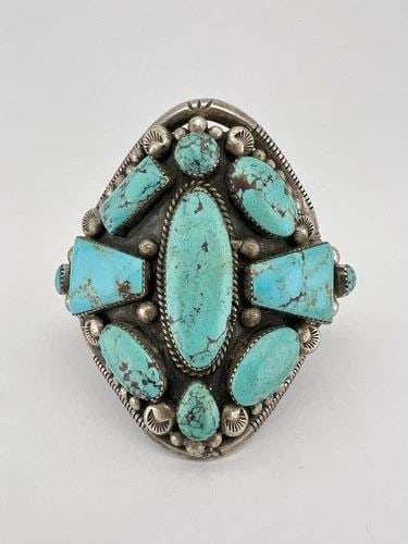 HUGE 3 3/8" VTG NAVAJO STERLING SILVER KINGMAN TURQUOISE CUFF BRACELET 130.8G: MASSIVE 3 3/8" Vtg Navajo Sterling Silver Kingman Turquoise Cuff Bracelet 130.8g Cuff is Just Under 6" tip to Tip and has an Over 1" Wide Slightly Adjustable Gap Cuff Is 3 3/8" Wide In the Center Weig