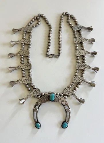 VTG NAVAJO STERLING SILVER TURQUOISE STAMPED FEATHER SQUASH BLOSSOM NECKLACE 27": Vtg Navajo Sterling Silver Turquoise Stamped Feather Squash Blossom Necklace 27" This Amazing necklace features huge specimens of Natural High-Grade Blue Gem Turquoise, secure in a Smooth bezel, and f