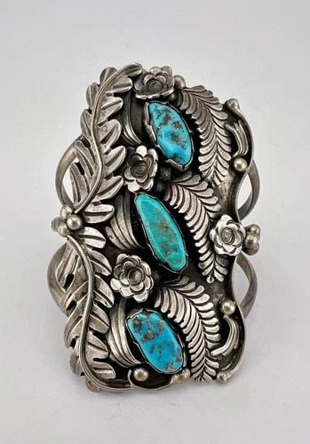 HUGE NAVAJO STERLING SILVER KINGMAN TURQUOISE STAMPED 3.25" WIDE CUFF BRACELET: HUGE Navajo Sterling Silver Kingman Turquoise Stamped 3.25" Wide Cuff Bracelet Cuff is A Tad Over 5 1/4" tip to Tip and has a Just Under 1 1/4" Wide - Adjustable Gap Cuff Is 3 1/4" Wide In the Center 