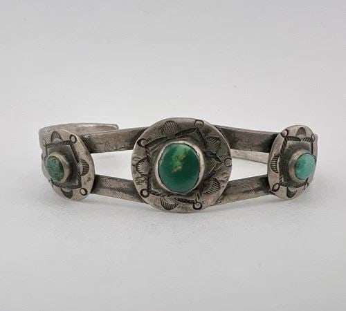 1930'S PAWN NAVAJO COIN SILVER INGOT CERRILLOS TURQUOISE STAMPED CUFF BRACELET: Early Old Pawn 1930's Navajo Coin Silver INGOT Cerrillos Turquoise Stamped Cuff Bracelet Cuff is 5 3/8" tip to Tip and has a 1 1/4" Wide Gap Cuff Is 3/4" Wide In the Center Weight is 27.8 Grams on my 