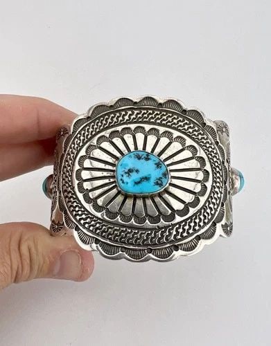 VTG NAVAJO STERLING SILVER SLEEPING BEAUTY TURQUOISE STAMPED CUFF BRACELET 96.6G: HUGE Vtg Navajo Sterling Silver Sleeping Beauty Turquoise Stamped Cuff Bracelet 96.6g Cuff is Just Under 6" tip to Tip and has a 1" Wide - Adjustable Gap Cuff Is 2 1/8" Wide In the Center Weight is 96