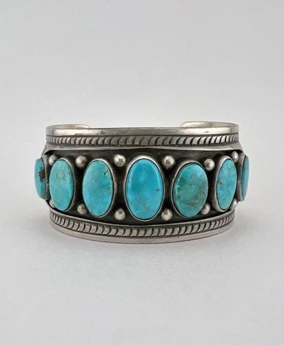 OLD NAVAJO STERLING SILVER NEVADA BLUE GEM TURQUOISE STAMPED CUFF BRACELET 66.5G: OLD NAVAJO STERLING SILVER NEVADA BLUE GEM TURQUOISE STAMPED CUFF BRACELET 66.5G OLD Navajo Sterling Silver Nevada Blue Gem Turquoise Stamped Cuff Bracelet 66.5g Cuff is 5 1/4" tip to Tip and has a 1 