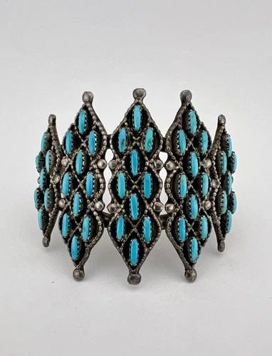VTG QUAM ZUNI STERLING SILVER NEEDLEPOINT TURQUOISE 2 1/8" WIDE CUFF BRACELET: Vtg QUAM Zuni Sterling Silver Needlepoint Turquoise 2 1/8" Wide Cuff Bracelet Cuff is 5 1/4" tip to Tip and has a 1 1/4" Wide Slightly Adjustable Gap Cuff Is 2 1/8" Wide In The Center Weight is 48.6 G