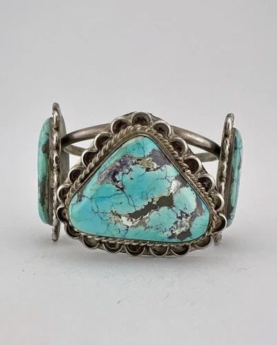 MASSIVE VTG NAVAJO STERLING SILVER INDIAN MOUNTAIN TURQUOISE CUFF BRACELET 93G: MASSIVE Vtg Navajo Sterling Silver Indian Mountain Turquoise Cuff Bracelet 93g Cuff is 5 5/8" tip to Tip and has a 1" Wide - Slightly Adjustable Gap Cuff Is 1 7/8" Wide In the Center Weight is 93.00 G