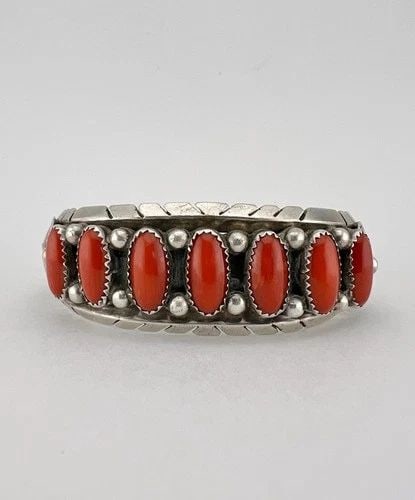 VTG M. BENNETT NAVAJO STERLING SILVER MEDITERRANEAN CORAL STAMPED CUFF BRACELET: Vtg M. Bennett Navajo Sterling Silver Mediterranean Coral Stamped Cuff Bracelet Cuff is 5 1/2" tip to Tip and has a Around 1" Wide - Slightly Adjustable Gap Cuff Is About 1" Wide Weight is 53.0 Grams 