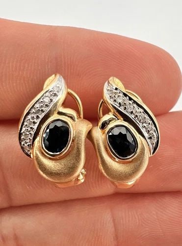 DESIGNER 14K YELLOW GOLD BLUE SAPPHIRE & DIAMOND OMEGA BACK POST EARRINGS: DESIGNER 14K YELLOW GOLD BLUE SAPPHIRE & DIAMOND OMEGA BACK POST EARRINGS Designer 14K Yellow Gold Blue Sapphire & Diamond Omega Back Post Earrings Size: 3/4" Tall By Just Under 1/2" Wide Metal: 14k Y