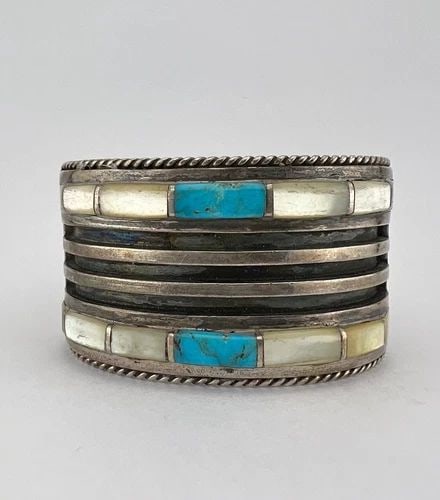 VTG NAVAJO STERLING SILVER TURQUOISE & MOTHER OF PEARL ROW CUFF BRACELET 119.3G: VTG NAVAJO STERLING SILVER TURQUOISE & MOTHER OF PEARL ROW CUFF BRACELET 119.3G Vtg Navajo Sterling Silver Turquoise & Mother Of Pearl Row Cuff Bracelet 119.3g Cuff is 5" tip to Tip and has a 1 1/2" W