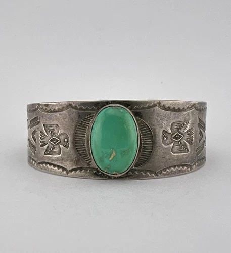 1940'S FRED HARVEY NAVAJO STERLING TURQUOISE STAMPED THUNDERBIRD CUFF BRACELET: 1940'S FRED HARVEY NAVAJO STERLING TURQUOISE STAMPED THUNDERBIRD CUFF BRACELET OLD 1940's Fred Harvey Era Navajo Sterling Turquoise Stamped Thunderbird Cuff Bracelet Cuff is 5 1/2" tip to Tip and has 