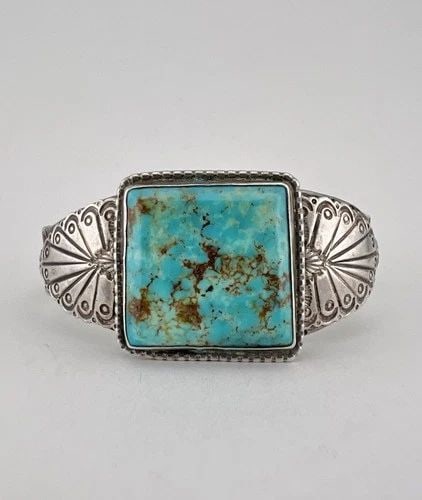 EARLY OLD NAVAJO COIN SILVER INGOT NEVADA TURQUOISE STAMPED CUFF BRACELET: EARLY OLD NAVAJO COIN SILVER INGOT NEVADA TURQUOISE STAMPED CUFF BRACELET Early OLD PAWN Navajo Coin Silver INGOT Nevada Turquoise Stamped Cuff Bracelet Cuff is 5 3/4" tip to Tip and has a 1 1/4" Wide