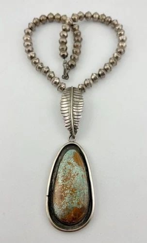 VTG NAVAJO STERLING SILVER ROYSTON TURQUOISE STAMPED BENCH BEAD NECKLACE PENDANT: Vtg EB Navajo Sterling Silver Royston Turquoise Stamped Bench Bead Necklace PendantMEASUREMENTS: Necklace measures 17" Tip To Tip Pendant W/ Leaf is 4 1/2" Tall With Dangle Royston Pendant itself is 2