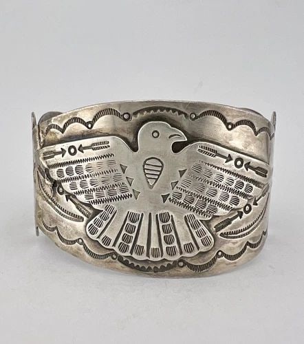 1940S FRED HARVEY NAVAJO COIN SILVER THUNDERBIRD STAMPED ARROWHEAD CUFF BRACELET: 1940S FRED HARVEY NAVAJO COIN SILVER THUNDERBIRD STAMPED ARROWHEAD CUFF BRACELET 1940's Fred Harvey Navajo Coin Silver Thunderbird Stamped Arrowhead Cuff Bracelet Cuff is 5 3/4" tip to Tip and has a 1