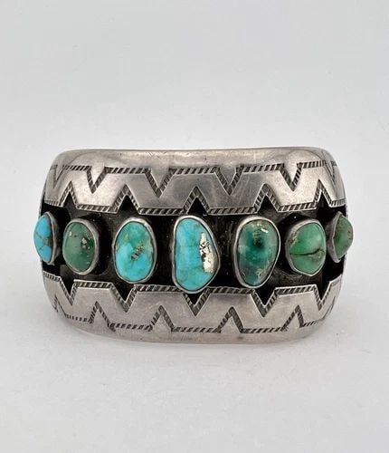 EARLY FRED HARVEY NAVAJO COIN SILVER CERRILLOS TURQUOISE SHADOWBOX CUFF BRACELET: EARLY FRED HARVEY NAVAJO COIN SILVER CERRILLOS TURQUOISE SHADOWBOX CUFF BRACELET Early Fred Harvey Navajo Coin Silver Cerrillos Turquoise Shadowbox Cuff Bracelet Cuff is 5 1/4" tip to Tip and has a 1 